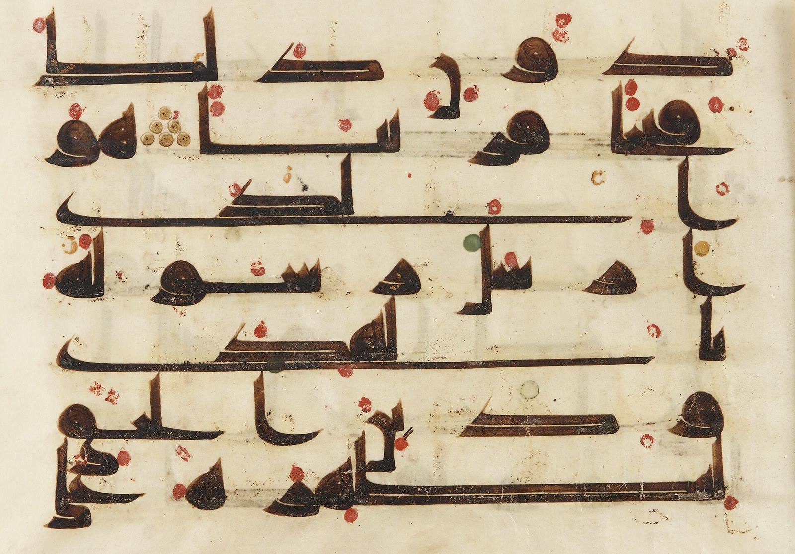 Qur'an folio in early Kufic script on parchment